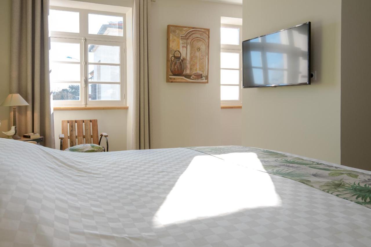 Sur Le Quai Bed & Breakfast การ์กาซอน ภายนอก รูปภาพ